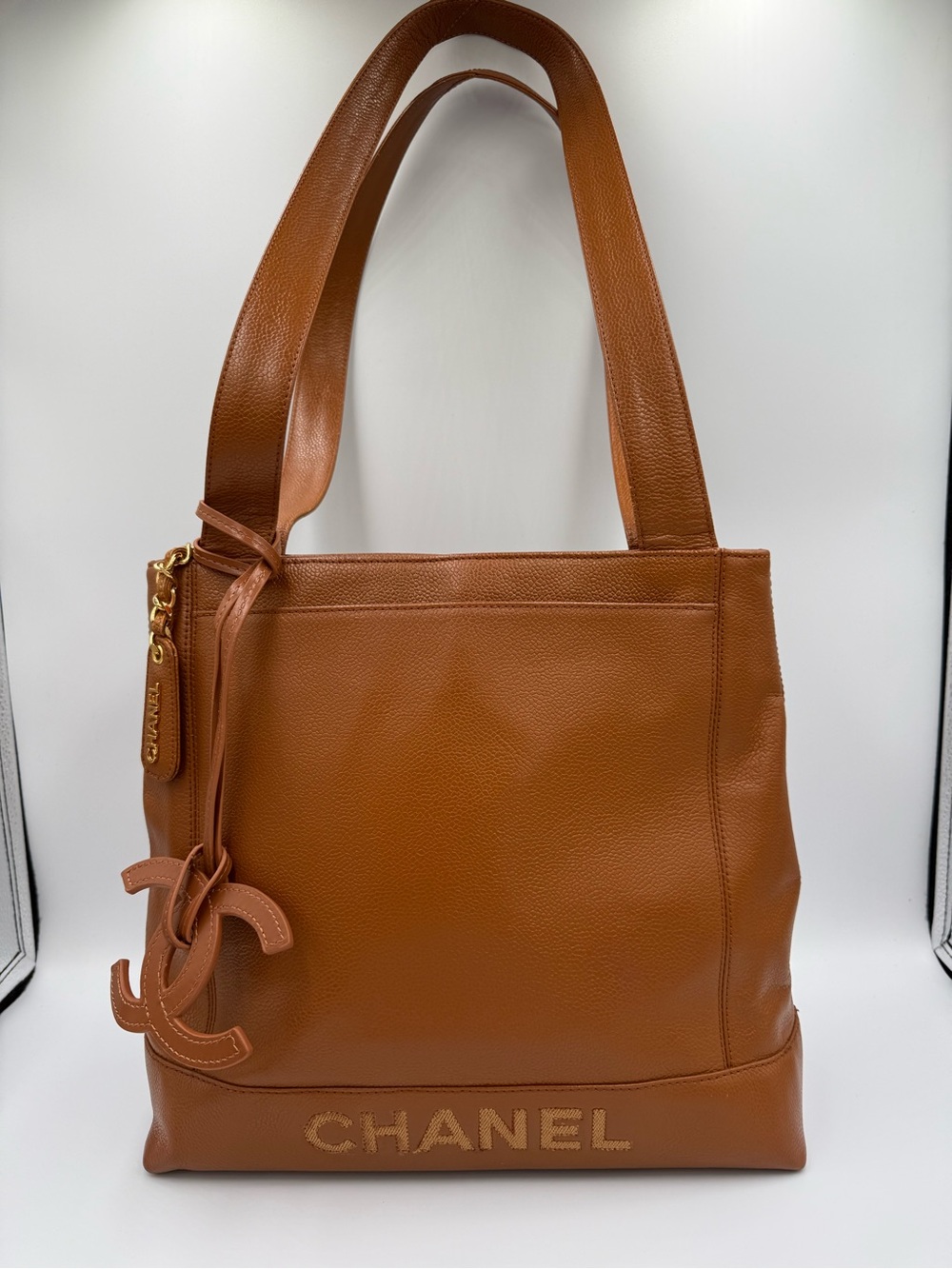 CHANEL Tan/Brown Caviar Leather Tote with CC Charm and Gold Hardware